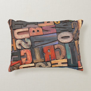 antique letterpress ing blocks with color ink pati decorative cushion