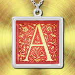 Antique ornamental monogram -  capital A Silver Plated Necklace<br><div class="desc">Antique ornamental monogram - capital A in red and cream ..Beautiful mediaeval initial from the 16th century .Courtesy of the Internet Archive Book Images . The original image was retouched and applied on this item by Alma Wad . This necklace is great for Arthur , Anthony , Andrew and more...</div>