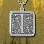 antique ornate monogram - letter T  Silver Plated Necklace<br><div class="desc">Antique ornate monogram - letter T in silvery  greys . Elegant 16th-century decorative initial with a floral motif. Alma Wad edited and applied the original picture to this Necklace .
Courtesy of the Internet Archive Book Images .</div>