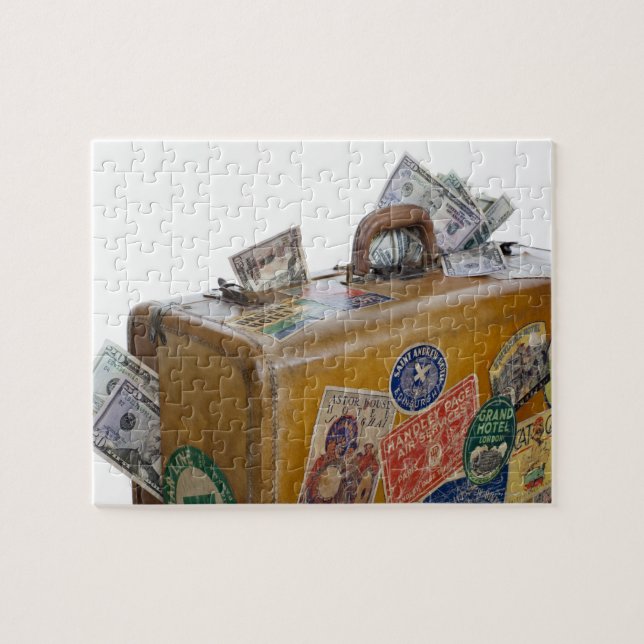 Antique suitcase with protruding money jigsaw puzzle (Horizontal)