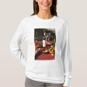 Aperitif and appetizers prepared: bread, olives, T-Shirt