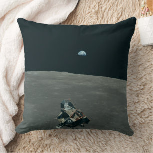 Apollo Lunar Lander and Earthrise Over Moon Cushion