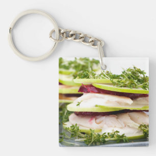 Apple and trout appetizer key ring