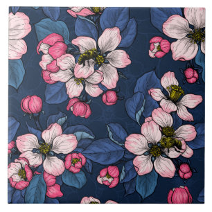 Apple blossom on a dark blue ceramic tile