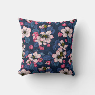 Apple blossom on a dark blue cushion