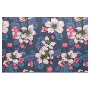 Apple blossom on a dark blue fabric