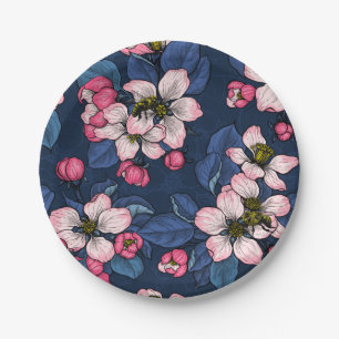 Apple blossom on a dark blue paper plate