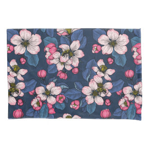 Apple blossom on a dark blue pillowcase