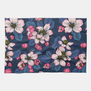 Apple blossom on a dark blue tea towel