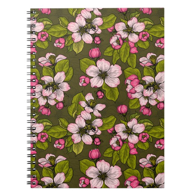 Apple blossom on dark green notebook (Front)
