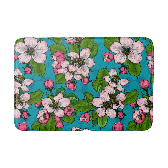 Apple blossom on turquoise bath mat (Front)