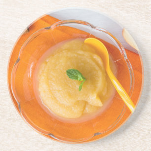 Applesauce with cinnamon and orange spoon coaster