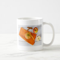 Applesauce with cinnamon and orange spoon