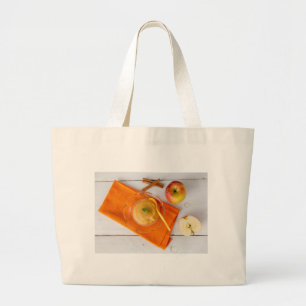 Applesauce with cinnamon and orange spoon large tote bag