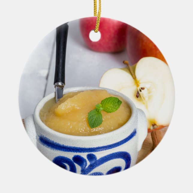 Applesauce with cinnamon in stoneware bowl ceramic ornament (Front)