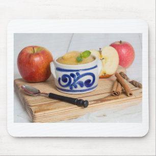 Applesauce with cinnamon in stoneware bowl mouse pad