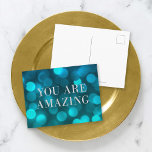 Aqua Blue Bokeh Lights Faux Silver You Are Amazing Postcard<br><div class="desc">Chic motivational postcard featuring the words "You Are Amazing" in faux silver foil against an aqua blue bokeh lights pattern background. To add text to the the card click the "Customise" button. *Please note that the Zazzle Watermark that appears in the zoom preview will NOT appear on the final printed...</div>