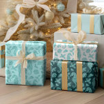 Aqua Blue Christmas Coastal Glitter Seahorses  Wrapping Paper Sheet<br><div class="desc">This ocean inspired coastal Christmas wrapping paper set features aqua blue glitter seahorses,  seashells,  and holly sprigs,  on aqua blue,  dark teal,  and white backgrounds. If you would like this design on more products or other colorways,  or for other design-related enquiries,  please contact me through Zazzle Chat.</div>