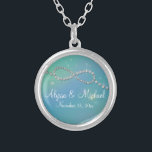Aqua Infinity Symbol Sign Infinite Love Twinkling Silver Plated Necklace<br><div class="desc">COLOR PALETTE: aqua blue and sky blue with rainbow touches. DESIGN COLLECTION: Matching the wedding invitation set of the same name. Perfect for spring or winter weddings with its shimmery, sparkling, twinkling lights sparkle off graphically created jewels in a modern Infinity Sign motif. A Shimmer of rainbow light illuminates the...</div>