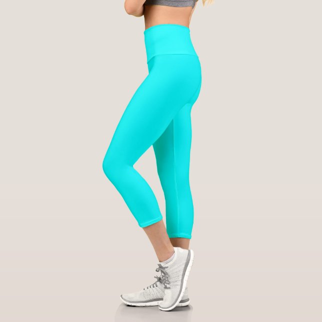 Aqua (solid colour) capri leggings (Left)
