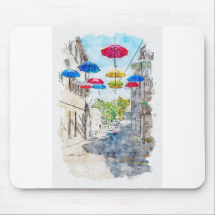 Aquarelle sketch art. Street with multicolored umb Mouse Pad