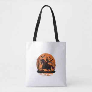 arafed knight on a horse with a pumpkin on his hea tote bag