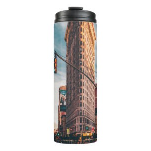 ARCHITECTURAL PHOTOGRAPHY OF BROWN BUILDING THERMAL TUMBLER