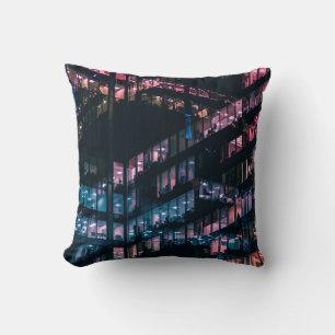 ARCHITECTURAL PHOTOGRAPHY OF BUILDING WITH PEOPLE CUSHION