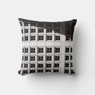 ARCHITECTURAL PHOTOGRAPHY OF WHITE BUILDING CUSHION