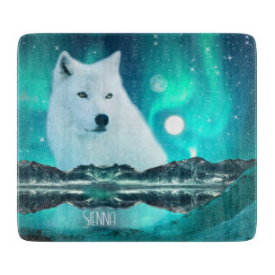Arctic wolf and magical night with northern lights cutting board