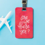 Are we there yet fun cute pink handlettered luggage tag<br><div class="desc">Pick a luggage tag with some pop! This bright, colourful and fun hand-lettering design reads "are we there yet" on a pink background and has a spot on the back for name and contact info. This design was created by Lea Delaveris Design for And So Much More and makes a...</div>