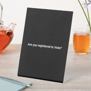 Are you registered to vote? minimalist white black pedestal sign