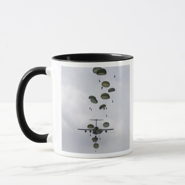 Army Soldiers jump out of a C-17 Globemaster II Mug (Left)