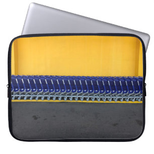 Arranged blue grocery carts laptop sleeve