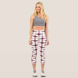 Art deco element in crimson capri leggings