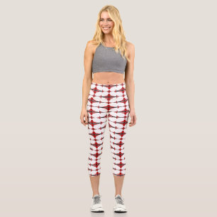 Art deco element in deep red capri leggings