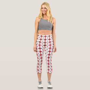 Art deco elements in deep red capri leggings