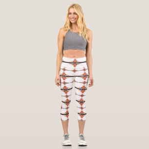 Art deco elements in pastel peach capri leggings
