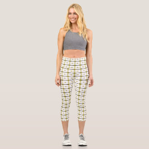 Art deco elements in pastel yellow capri leggings