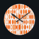 Art Deco Ovals  Round Clock<br><div class="desc">This clock has an art deco design made of ovals and half ovals in white and shades of orange.</div>