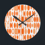 Art Deco Ovals Round Clock<br><div class="desc">This clock has an art deco design made of ovals and half ovals in white and shades of orange.</div>