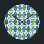 Art Deco Rain Argyle Round Clock<br><div class="desc">This wall clock has an art deco design of diamond shapes made from overlapping angles in black lines colored in shades of blue and green with diagonal black lines making the design look like argyle</div>