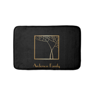 Art deco style faux gold tree with frame on black bath mat