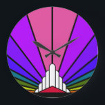 Art deco sun in rainbow Wall Clock<br><div class="desc">A classic art deco style sun pattern in rainbow. 

An iconic pattern of the sun rising from behind a stylised art deco shaped building. A simple yet elegant design,  true to the era.</div>