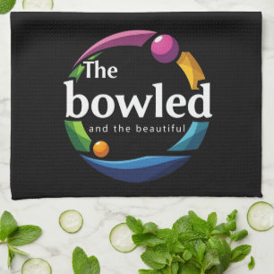 "Art in Motion: Circular Lawn Bowls Bowled Logo, Tea Towel