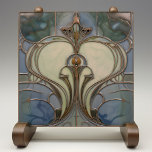 Art Nouveau Elegance Jade Bronze Ceramic Tile<br><div class="desc">Experience the allure of the Art Nouveau movement with this enchanting ceramic tile that artfully fuses jade green and bronze hues. It boasts an elegant, symmetrical design reminiscent of natural forms and structures, a signature of the period. The graceful lines and curves are highlighted in a burnished bronze tone, contouring...</div>