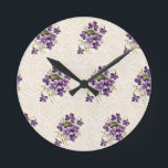 Art Nouveau Violet Floral Pattern – Vintage  Round Clock<br><div class="desc">Elegant Art Nouveau violet floral pattern featuring delicate purple violets with flowing botanical stems set against a subtle ornamental background. Inspired by vintage botanical illustrations and Art Nouveau wallpaper designs, this seamless pattern brings a romantic antique aesthetic perfect for home décor, stationery, and floral lovers. Ideal for cottagecore style, vintage...</div>