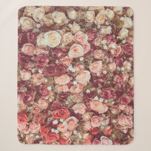 Artificial flowers, beautiful cloth background. sherpa blanket