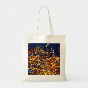 Artistic Fall Leaves Against Deep Blue Sky Tote Bag