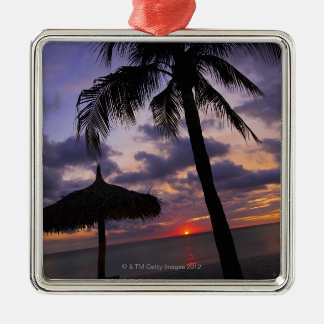 Aruba, silhouette of palm tree and palapa on metal ornament (Front)